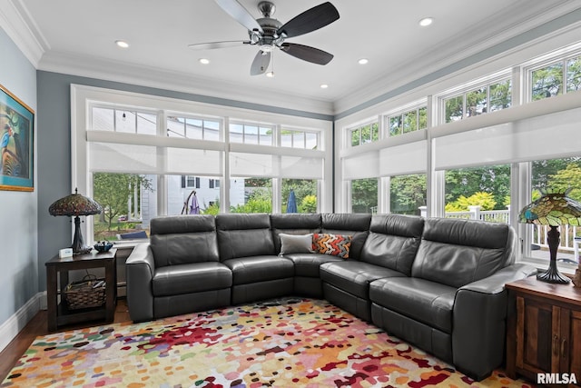 living room with a ceiling fan, wood finished floors, baseboards, recessed lighting, and ornamental molding