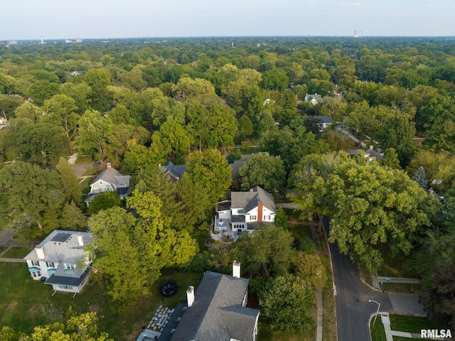 drone / aerial view featuring a view of trees