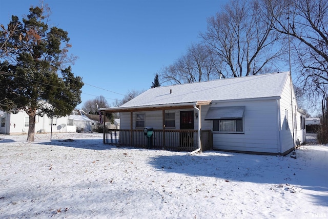 view of snow covered property