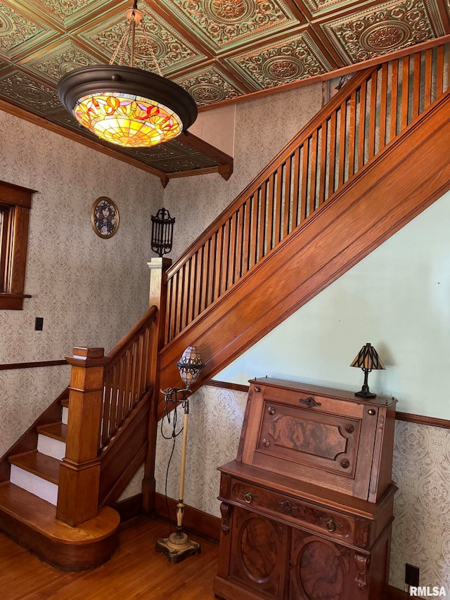 stairs with wood-type flooring