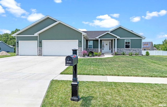 craftsman-style home with a garage and a front lawn