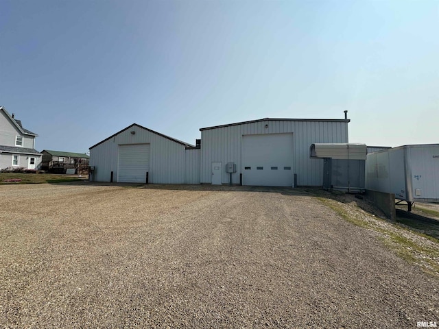 view of outbuilding featuring a garage