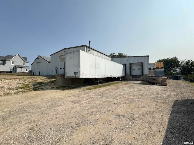 view of outdoor structure with a garage