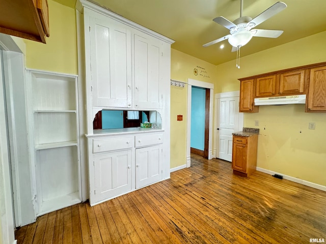 kitchen featuring light wood-type flooring and ceiling fan