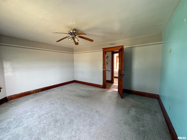 unfurnished bedroom featuring ceiling fan and carpet floors