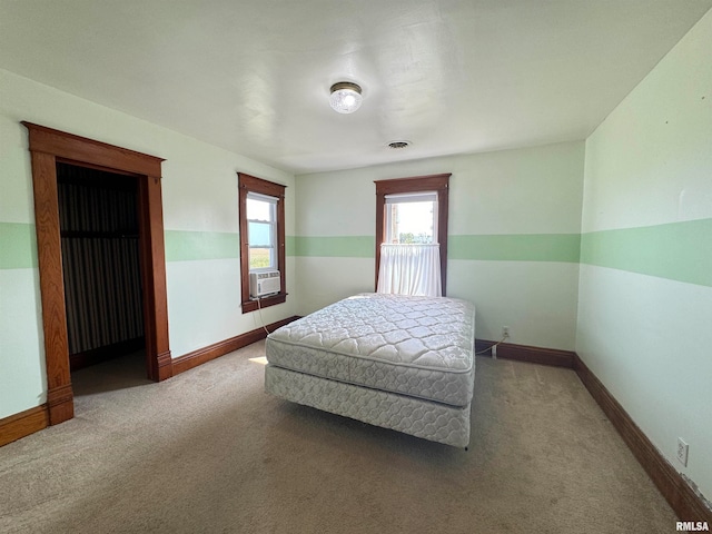 carpeted bedroom with cooling unit