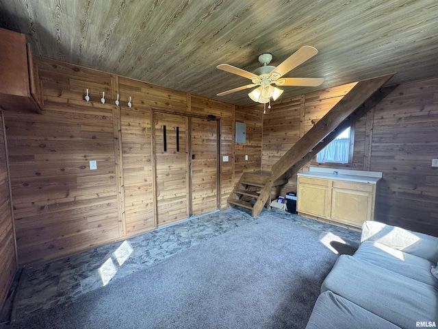 1677 E Smokey Rd, Avon, IL 61415 - interior space featuring wood ceiling, ceiling fan, wooden walls, and carpet floors