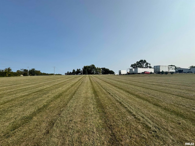 exterior space with a rural view