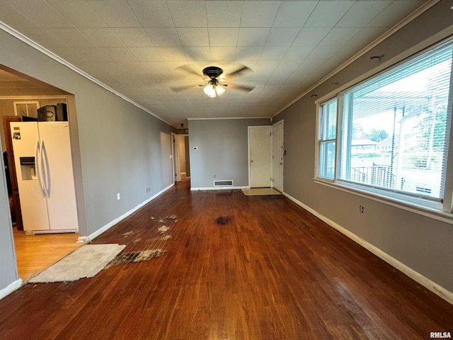 unfurnished room featuring wood-type flooring, ceiling fan, and crown molding