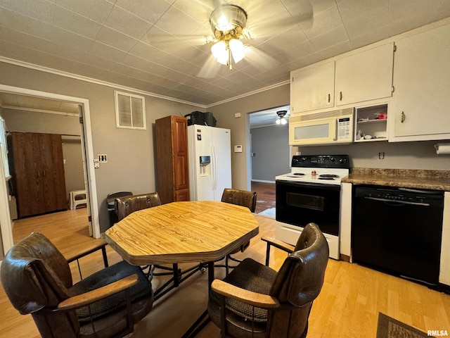 kitchen with light hardwood / wood-style floors, white cabinets, white appliances, ceiling fan, and ornamental molding