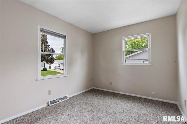 empty room featuring carpet flooring