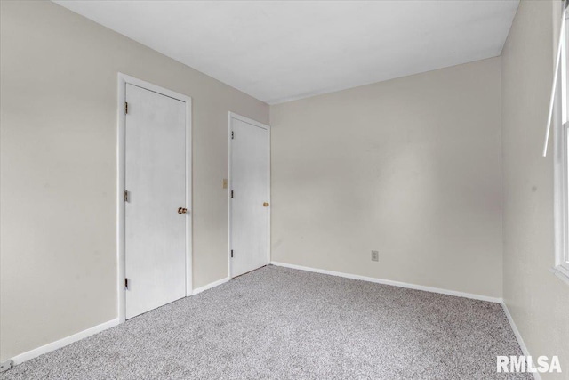 unfurnished bedroom featuring carpet floors