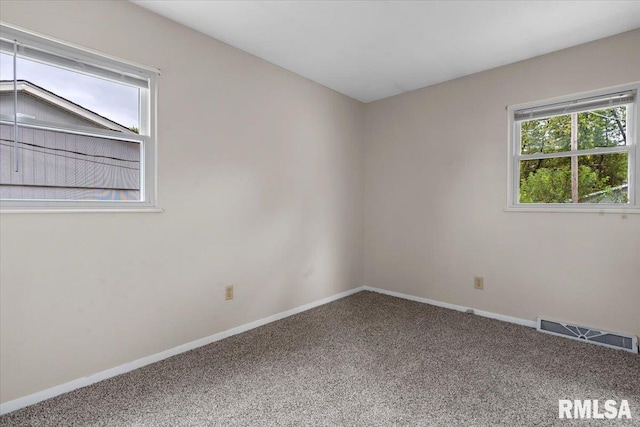 empty room featuring carpet