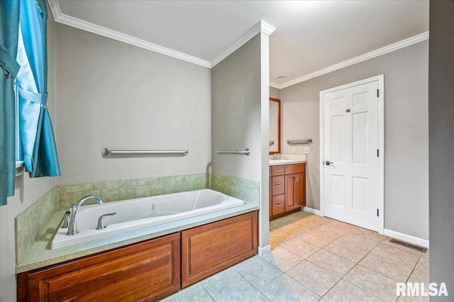 bathroom featuring tile patterned flooring, a washtub, ornamental molding, and vanity