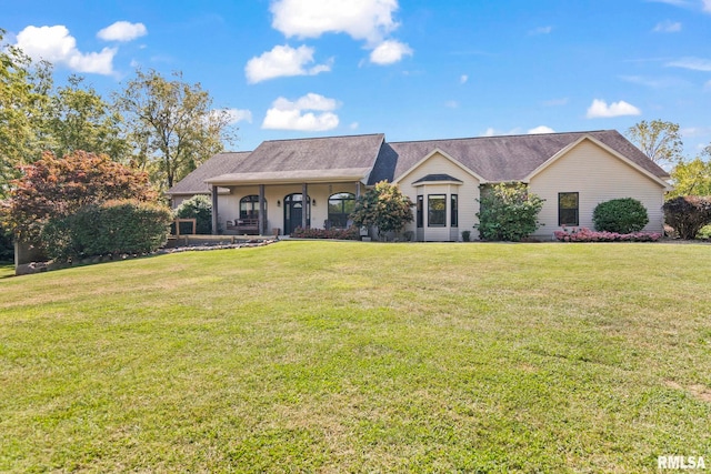 single story home featuring a front yard