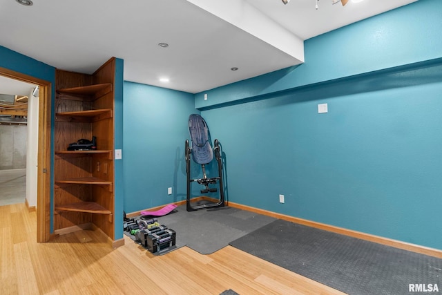 exercise area featuring hardwood / wood-style floors