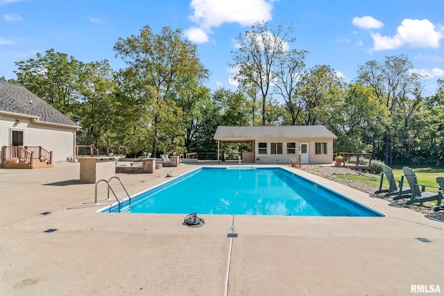 view of pool featuring a patio