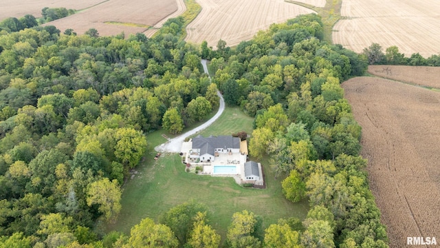 birds eye view of property with a rural view