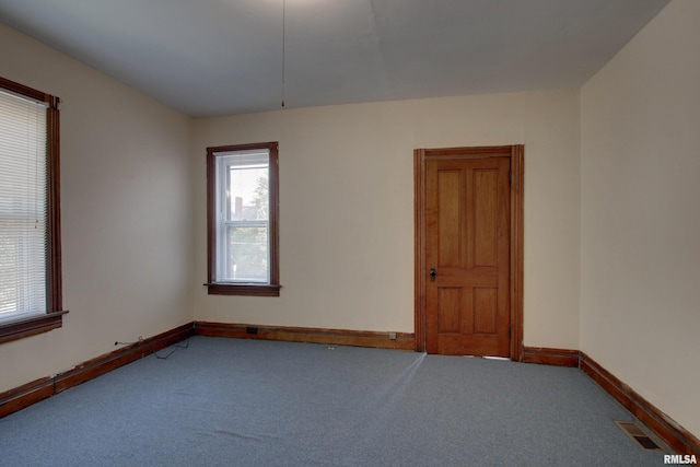 unfurnished room with carpet