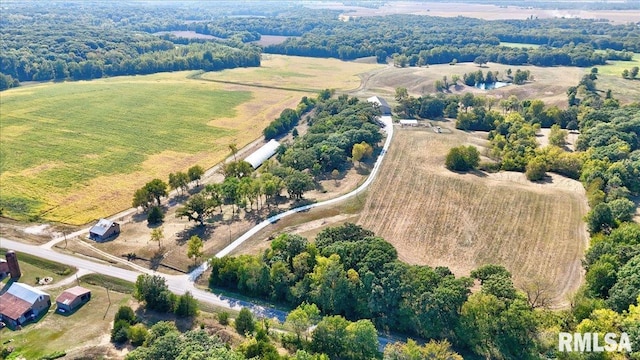 birds eye view of property with a rural view