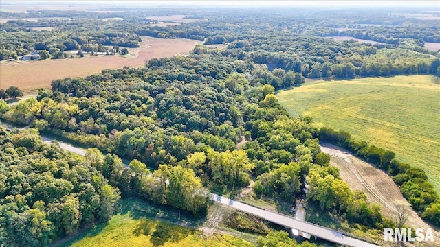 birds eye view of property with a rural view