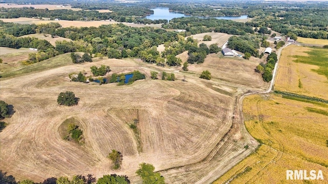 bird's eye view featuring a water view and a rural view