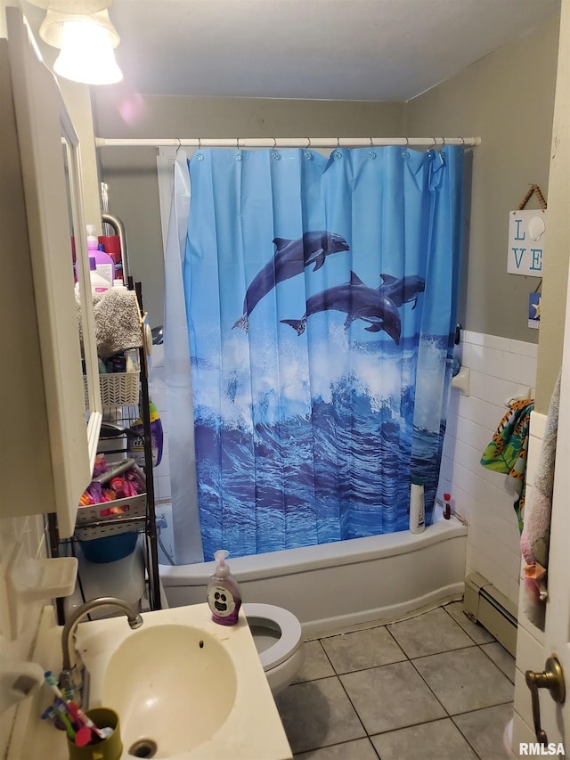 full bathroom with shower / bath combination with curtain, toilet, a baseboard heating unit, sink, and tile patterned floors