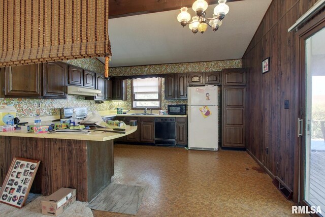 kitchen featuring dark brown cabinetry, lofted ceiling, wood walls, kitchen peninsula, and black appliances