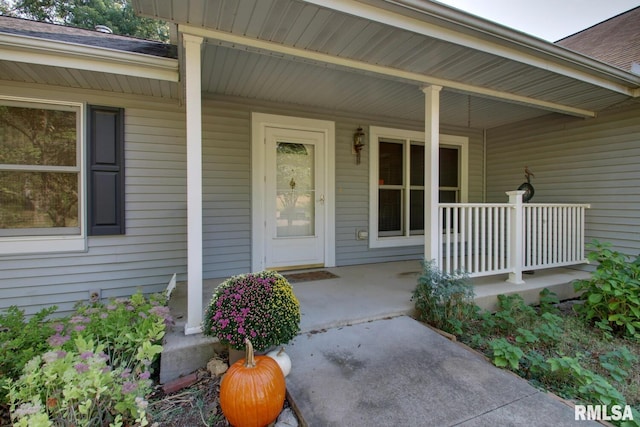 property entrance with covered porch