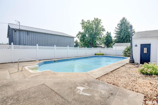 view of pool with a patio area