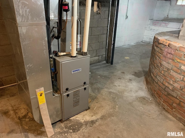 utility room with heating unit