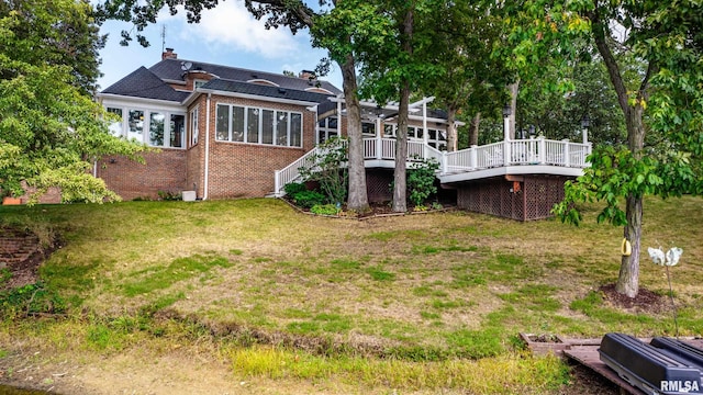 view of yard featuring a wooden deck