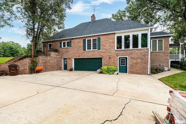 view of side of property featuring a garage