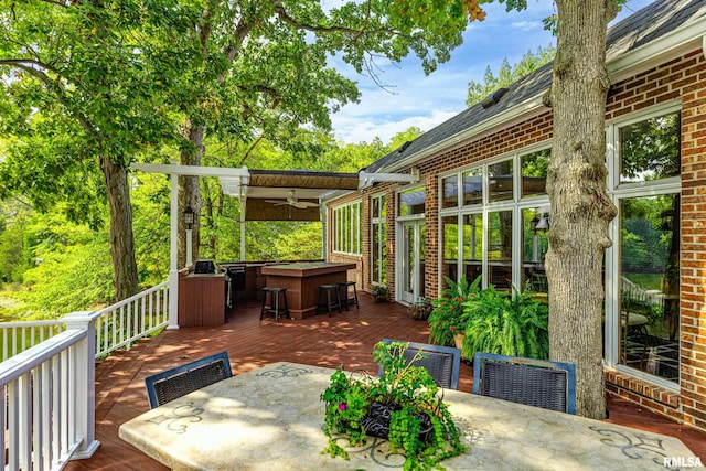 wooden terrace with ceiling fan