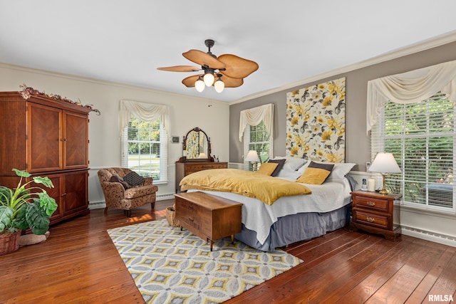 bedroom featuring ceiling fan, multiple windows, dark wood-type flooring, and crown molding