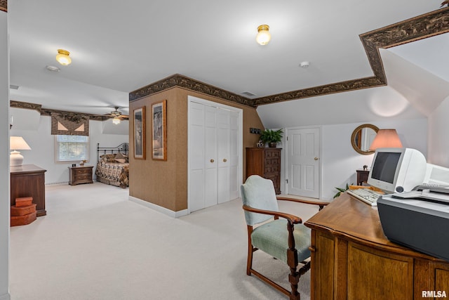 office with ceiling fan, lofted ceiling, and light carpet