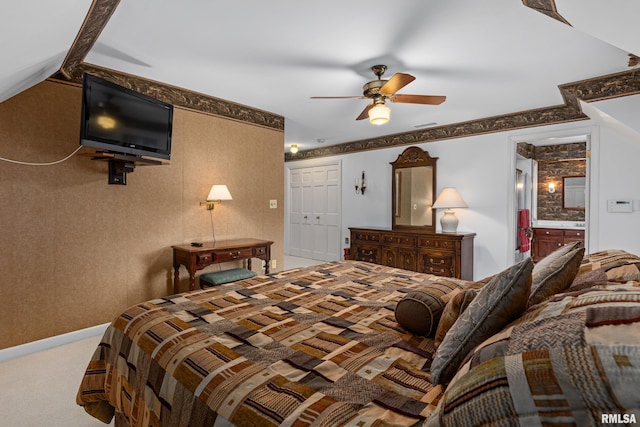 bedroom featuring carpet floors, ceiling fan, and a closet