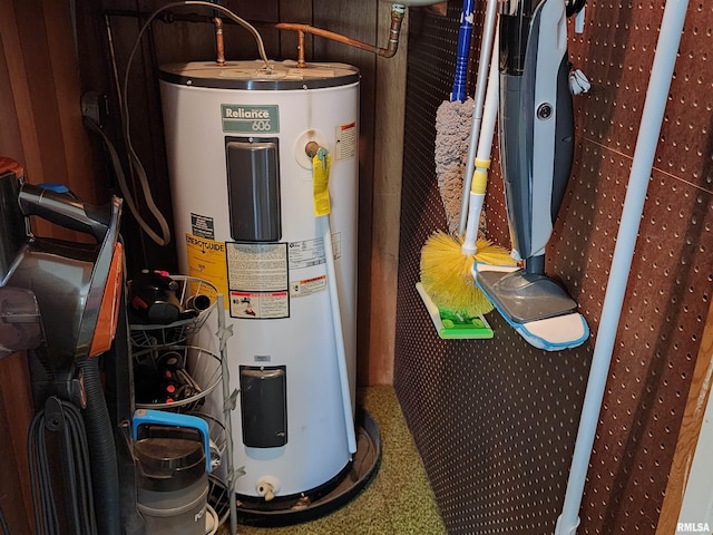 utility room with electric water heater