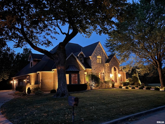 view of front of home with a front lawn