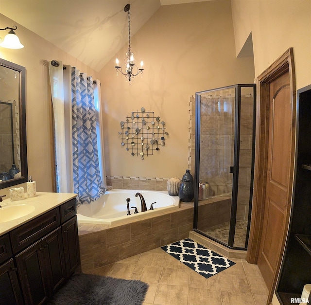 bathroom with independent shower and bath, vanity, vaulted ceiling, and a notable chandelier