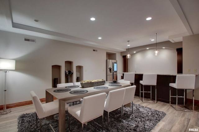 dining area featuring light hardwood / wood-style floors