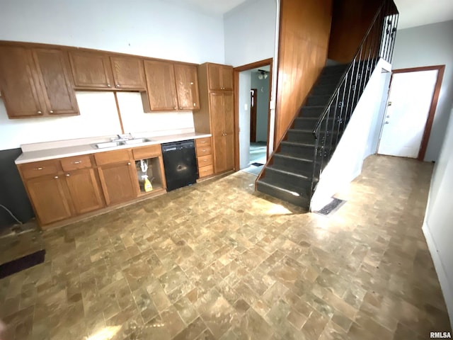 kitchen featuring black dishwasher and sink