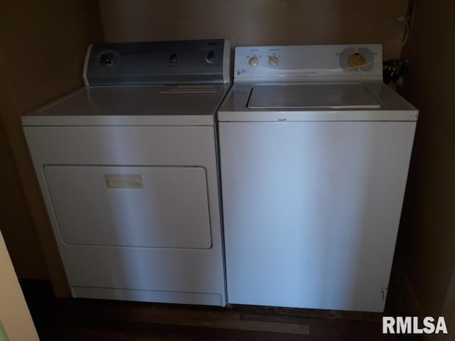 clothes washing area with independent washer and dryer