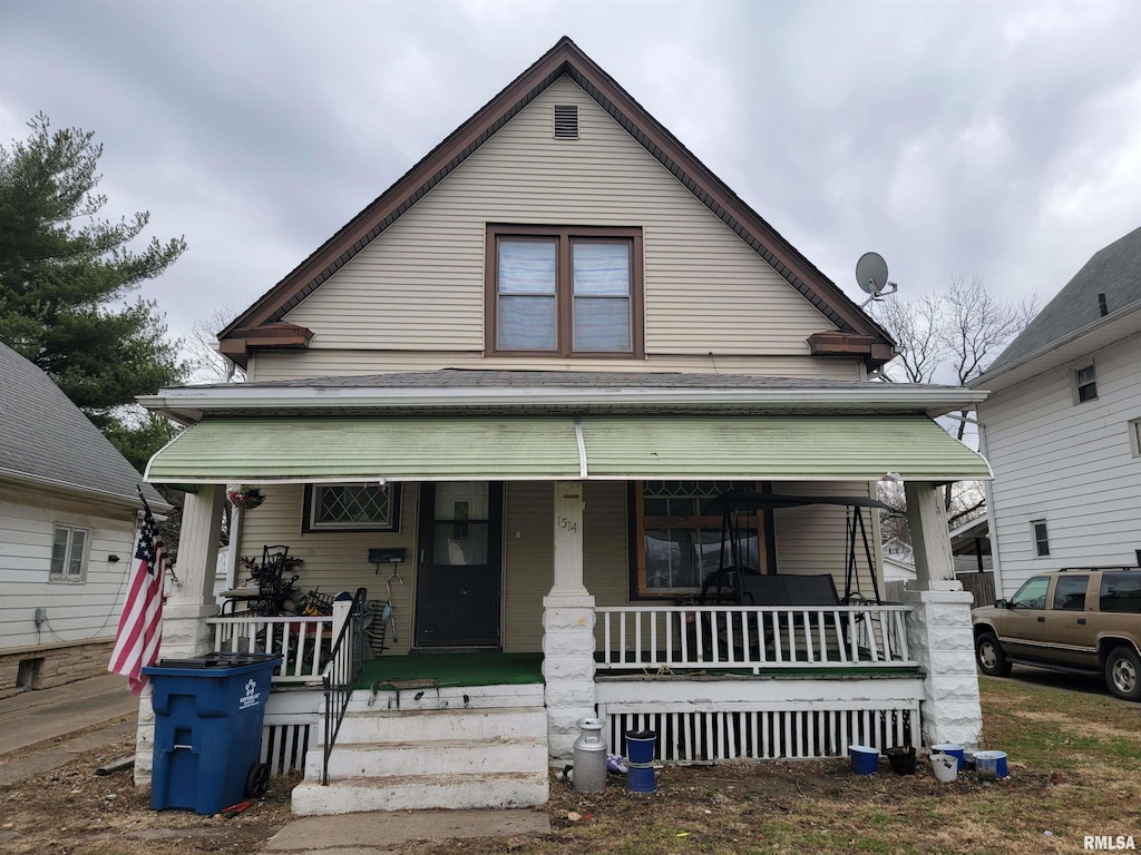 bungalow-style house featuring covered porch