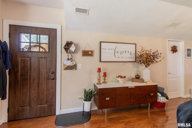 foyer featuring hardwood / wood-style flooring