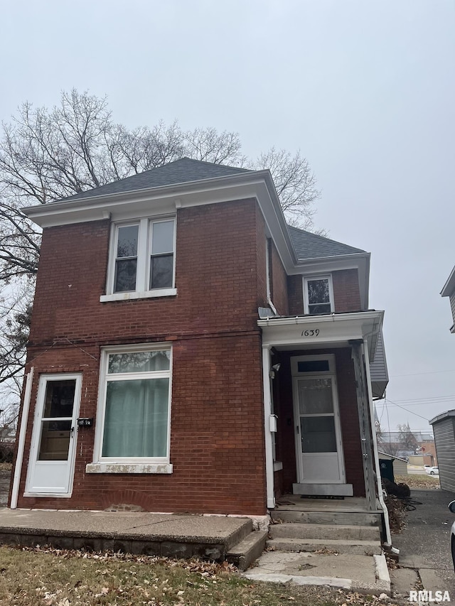 view of front of property with brick siding