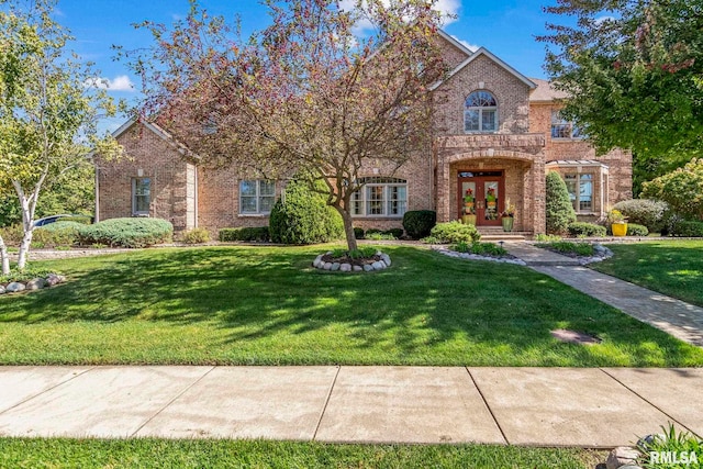 view of front of property with french doors and a front yard