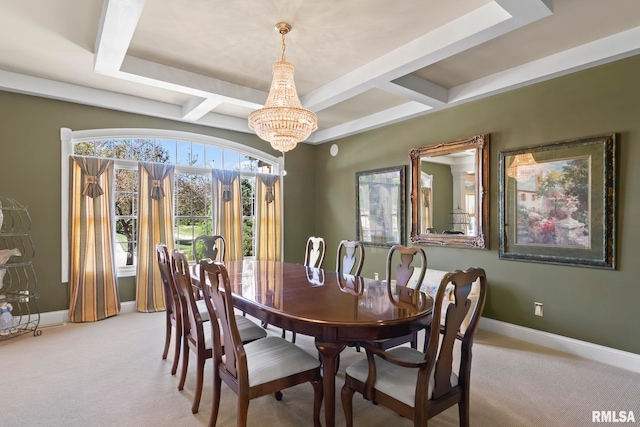 carpeted dining space featuring a notable chandelier