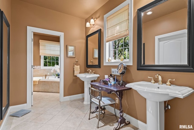 bathroom with sink, plus walk in shower, and tile patterned floors