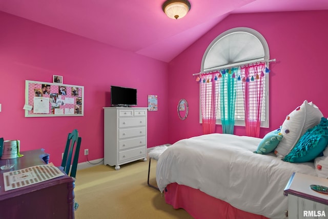 bedroom featuring lofted ceiling and light colored carpet